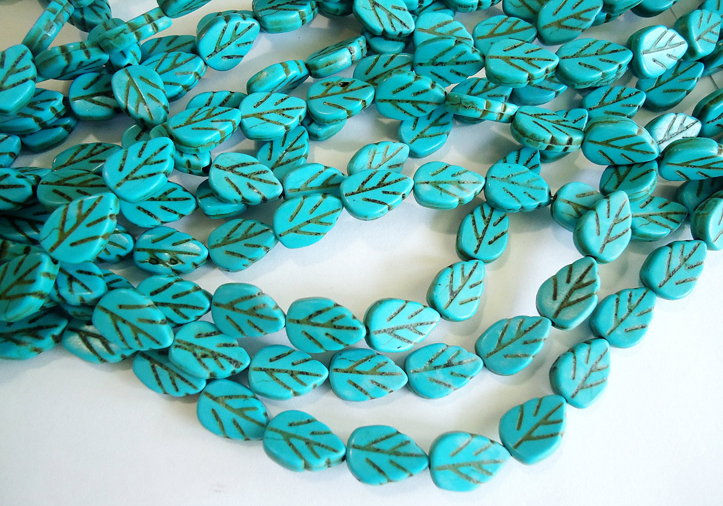 Turquoise Stone Leaves, 15.75" Strand, 30 Pieces, Synthetic Turquoise, 14mm x9mm x4mm
