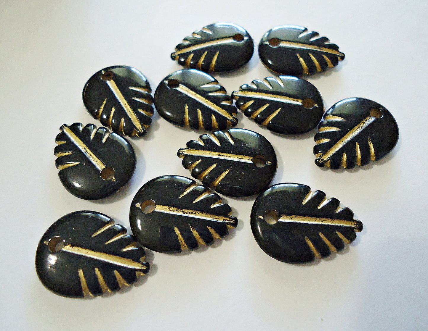 Acrylic Black Leaf Beads with Gold Enlaced Details, 20mm Tall, Set of 20