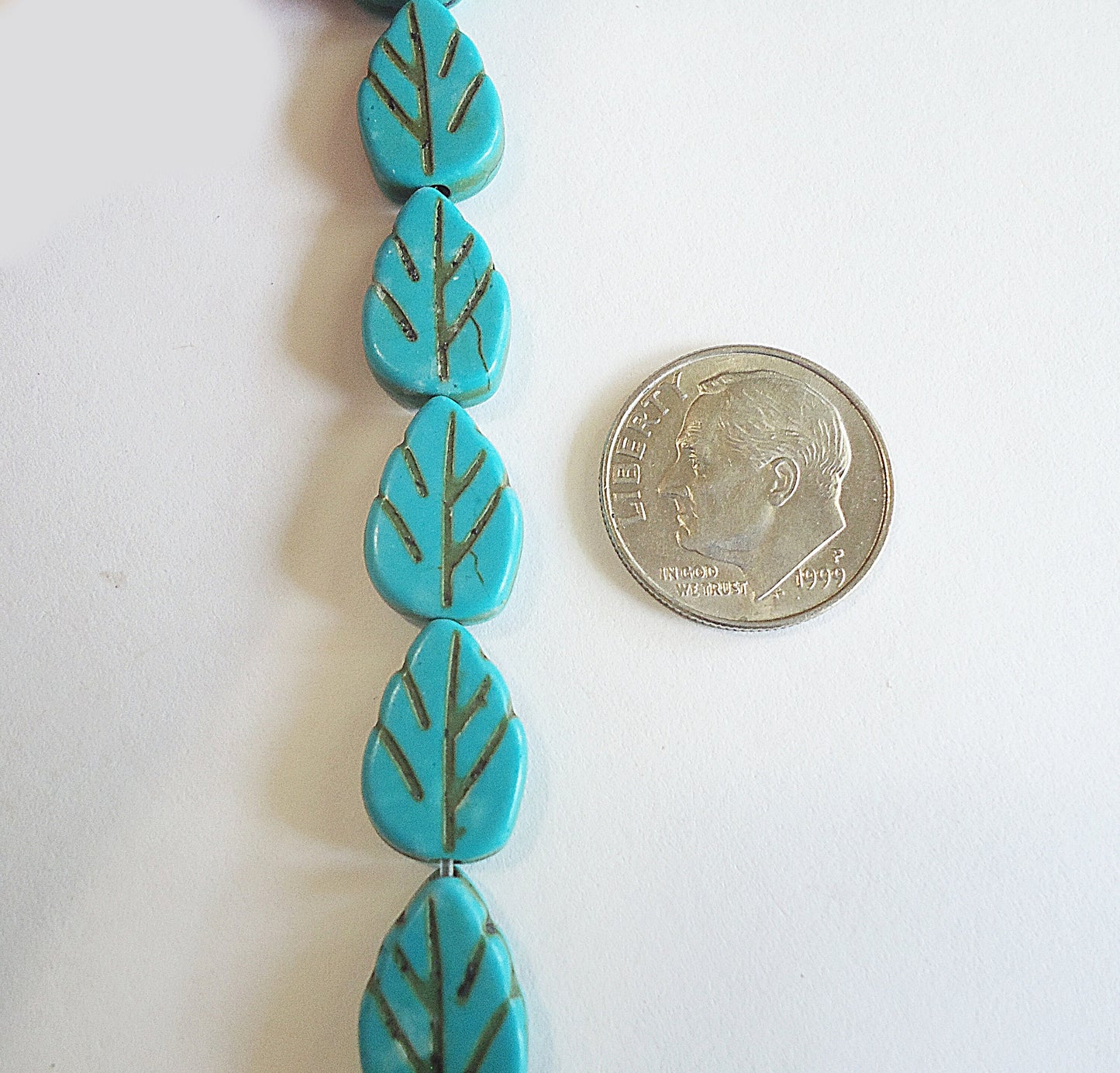 Turquoise Stone Leaves, 15.75" Strand, 30 Pieces, Synthetic Turquoise, 14mm x9mm x4mm