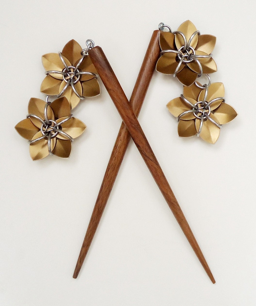 Pair of Six Inch Wooden Hair Sticks with Metallic Bronze Flowers