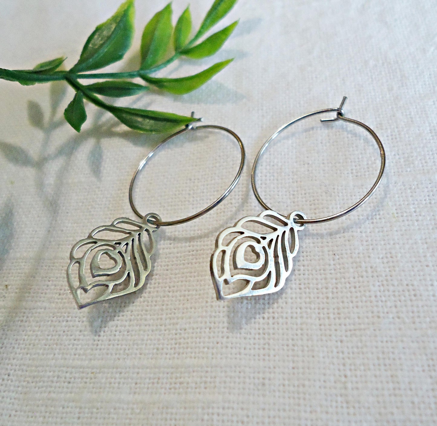 CORE ESSENTIALS - Stainless Steel Earrings, Silver Peacock Feathers