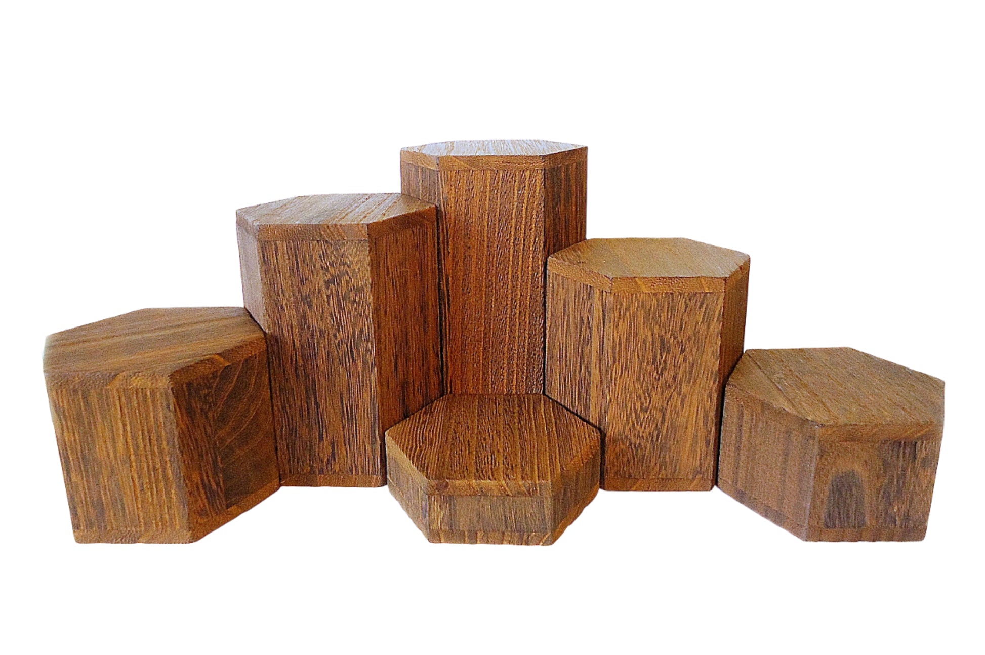 Set of hexagonal brown wooden blocks on a white background