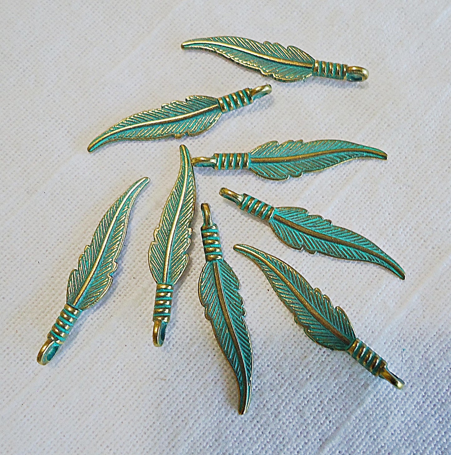 Feather Charms, Green Patina and Gold, 1.25" Long, Bulk Quantities